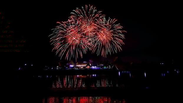 fireworks over the temple in the dark sky photo