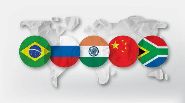 Brazil Russia India China and South Africa flag on world map for BRICS economic international cooperation concept photo