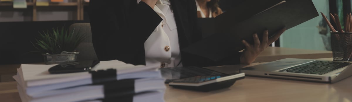 Entrepreneur Asian businessman and businesswoman discussing new business project in tablet in modern Meeting In Modern Office, Asian business casual concept. photo