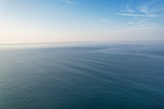 Most Beautiful View of British Landscape and Sea View of Durdle Door Beach of England Great Britain, UK. Image Was captured with Drone's camera on September 9th, 2023 photo