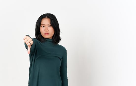Showing Thumbs Down and Looking at Camera Of Beautiful Asian Woman Isolated On White Background photo