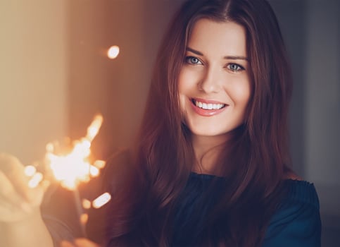 Holiday magic, Christmas and New Year celebration, happy woman with sparklers photo