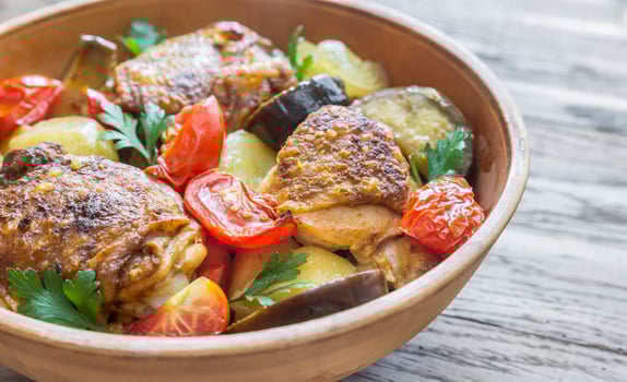 Indian spicy chicken with vegetables photo