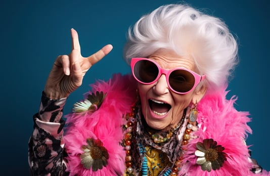 Cool old woman on vivid background photo