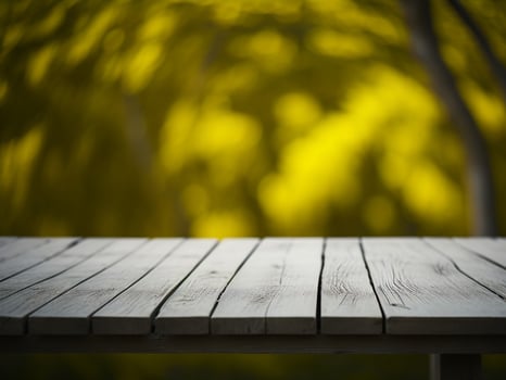 Wooden table and blur tropical green grass background, product display montage. High quality photo 8k FHD AI generated