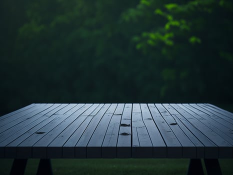 Wooden table and blur tropical green grass background, product display montage. High quality photo 8k FHD AI generated