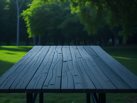 Wooden table and blur tropical green grass background, product display montage. High quality photo 8k FHD AI generated
