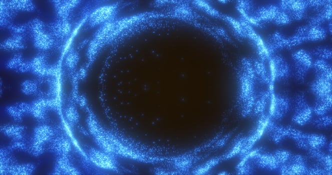 Abstract background of an energetic blue magic ring of glowing particles and a wave of energy photo