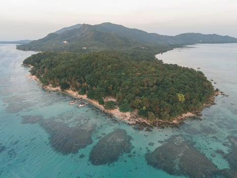 Aerial view of Karimunjawa Islands, Jepara, Indonesian archipelago, Volcano Island, coral reefs, white sand beaches. Top tourist destination, best diving snorkelling. photo