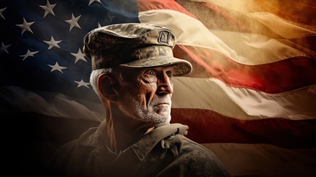 An elderly male soldier in military uniform standing in front of an american flag photo