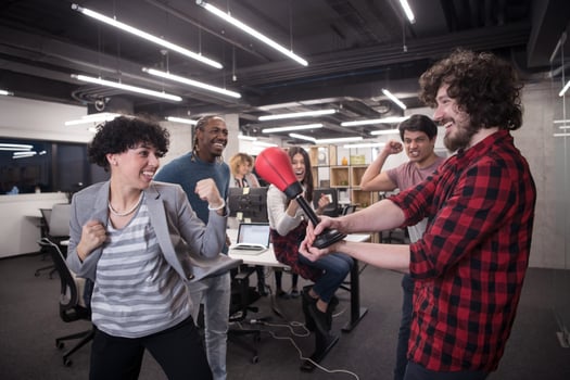 multiethnics business team boxing at office photo