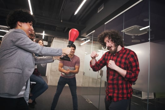 multiethnics business team boxing at office photo