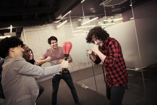 multiethnics business team boxing at office photo