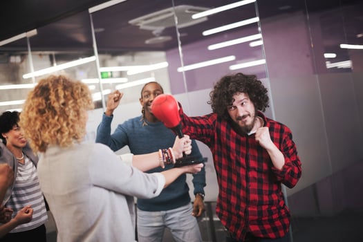 multiethnics business team boxing at office photo