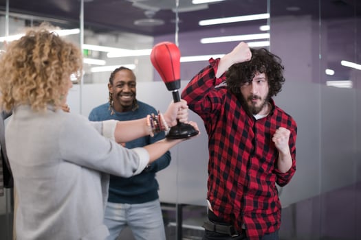multiethnics business team boxing at office photo