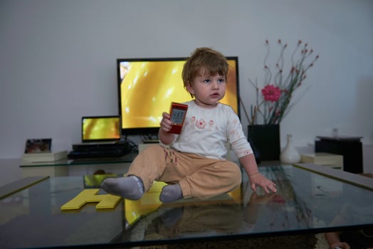 Adorable cute beautiful little baby girl playing with toys at home photo