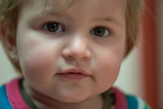 Closeup portrait of the one year old baby photo