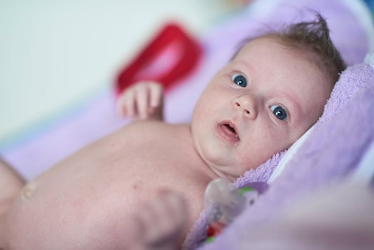 happy newborn little baby smilling photo