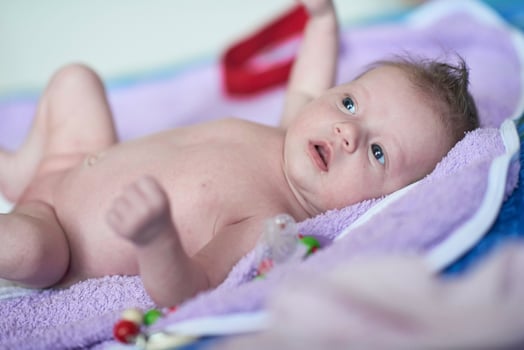 happy newborn little baby smilling photo