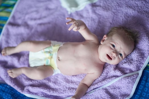 happy newborn little baby smilling photo
