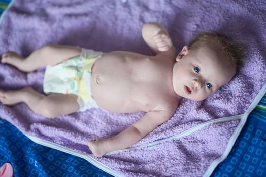 happy newborn little baby smilling photo