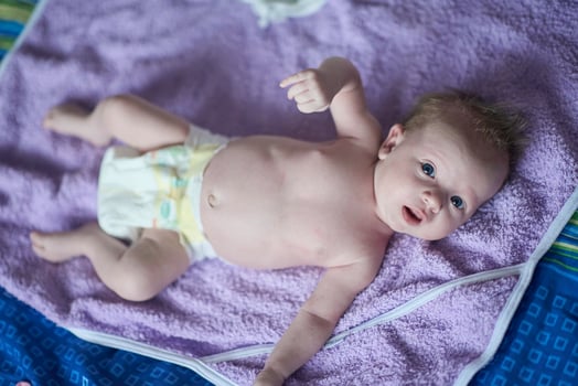 happy newborn little baby smilling photo