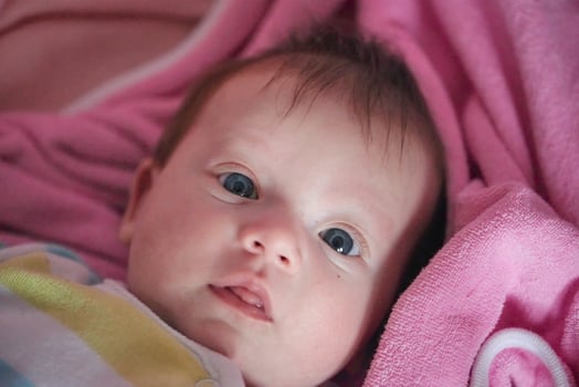 happy newborn little baby smilling photo