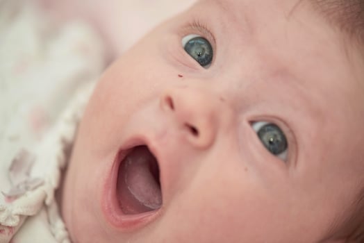 happy newborn little baby smilling photo