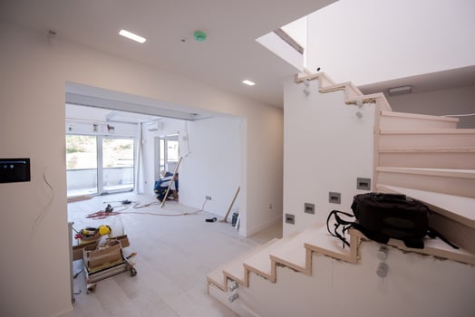 carpenters installing glass door with a wooden frame photo
