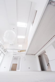 Interior of empty stylish modern open space two level apartment photo