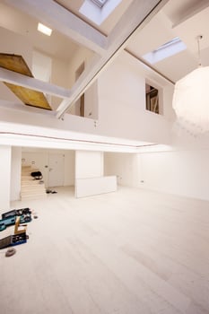 Interior of empty stylish modern open space two level apartment photo