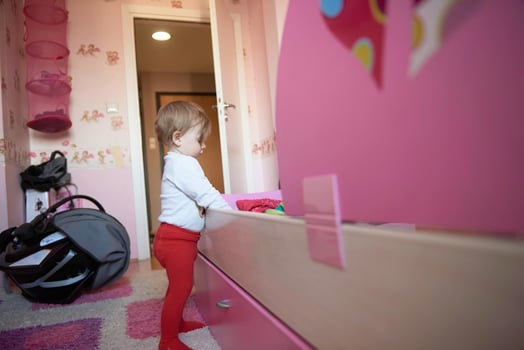 cute  little one year old baby and making first steps photo