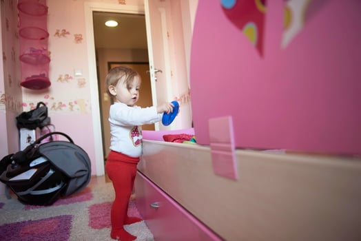 cute  little one year old baby and making first steps photo