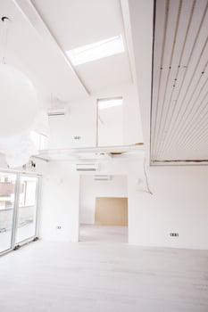 Interior of empty stylish modern open space two level apartment photo