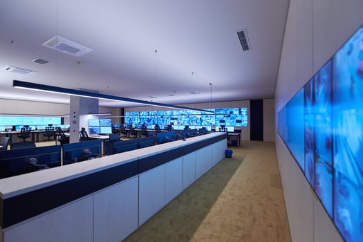 Empty interior of big modern security system control room photo