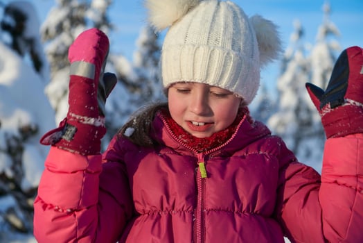 cute little girl  on beautiful winter day photo