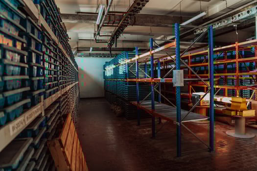 Gold mining storage rock core samples geology drilling industy. Large ore warehouse in modern industry, ores stacked in boxes. Selective focus photo