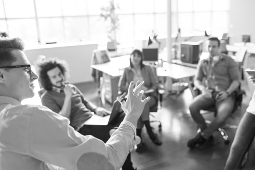 Young Business Team At A Meeting at modern office building photo