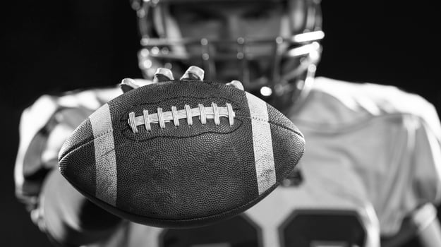 portrait of confident American football player photo