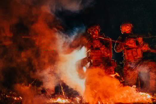 Soldiers squad in action on night mission using laser sight beam lights military team concept photo