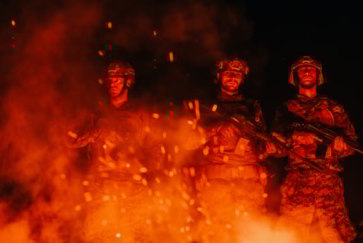 Soldiers squad in action on night mission using laser sight beam lights military team concept photo