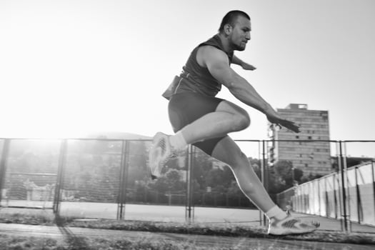 young athlete running photo
