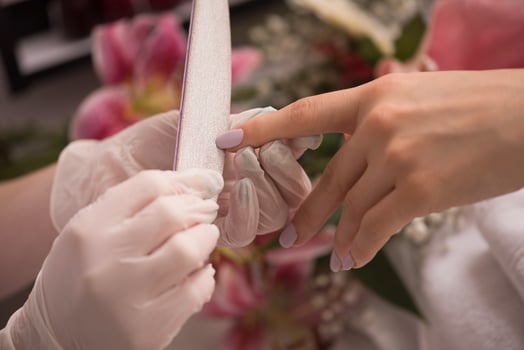 Woman hands receiving a manicure photo