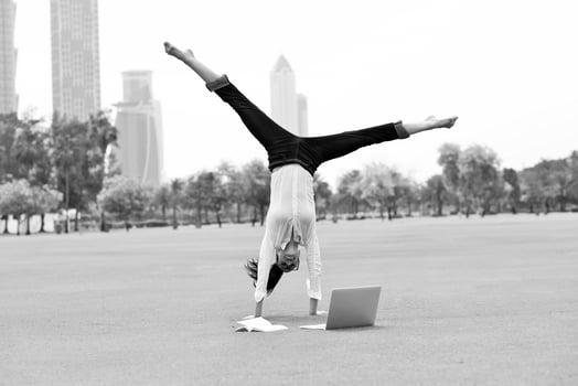 woman with laptop in park photo