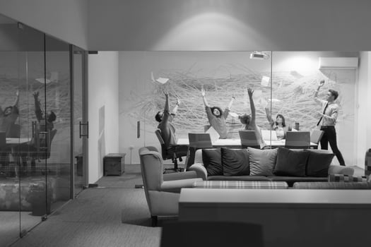Group of young business people throwing documents photo