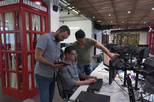 startup business people group working as team to find solution photo