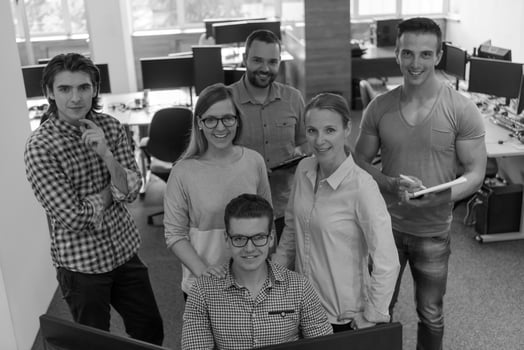 group of young startup business people standing as team photo