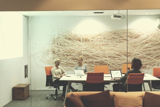Startup Business Team At A Meeting at modern night office building photo
