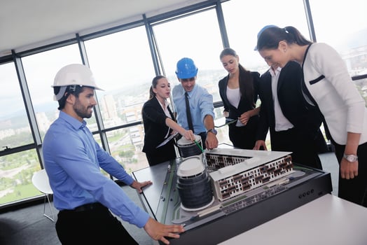 business people and engineers on meeting photo