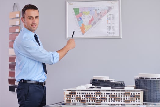 happy young business man at office photo